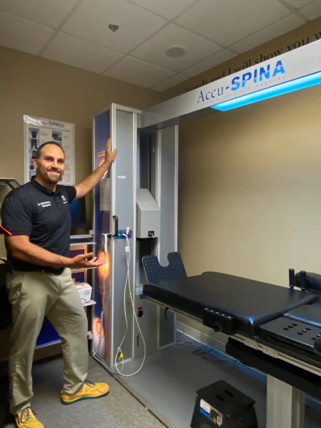 Chiropractor using spinal decompression machine