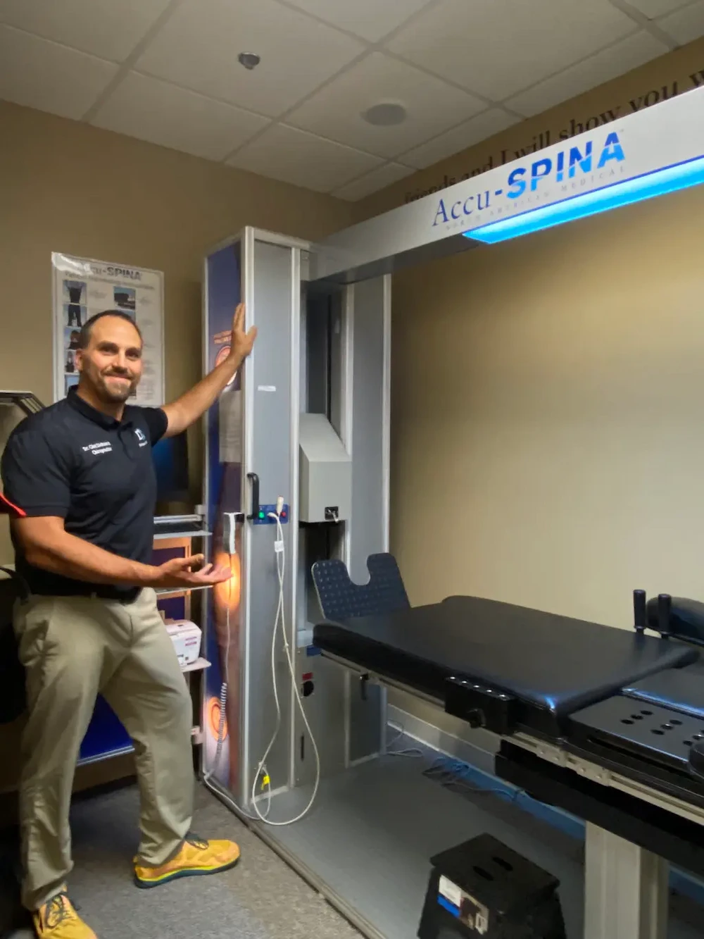 Doctor using spinal decompression machine to support back pain relief and recovery