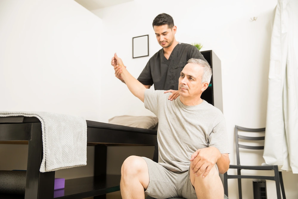 Senior patient receiving chiropractic care to improve mobility